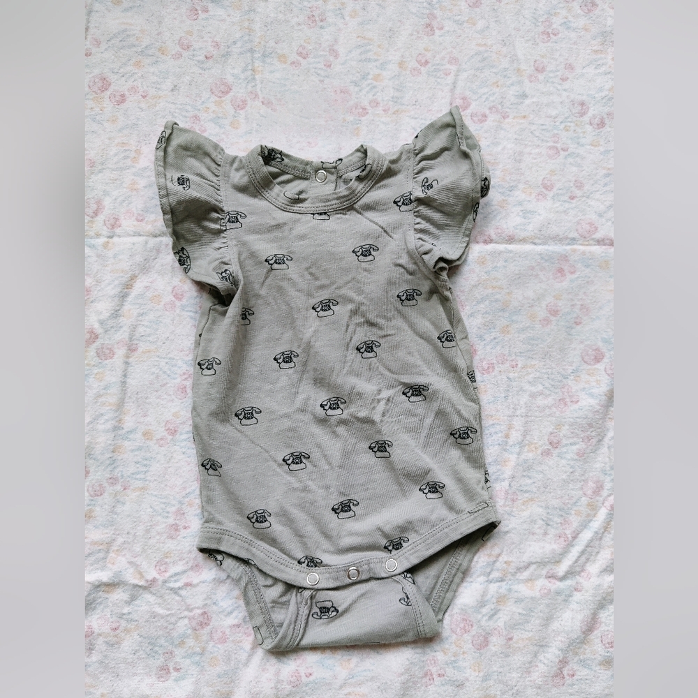 Kate Quinn flutter bodysuit